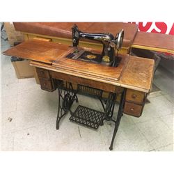 Singer Tredle Sewing Machine / Cabinet