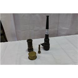 THREE BRASS NOZZLES AND BRASS WATER METER HANDLE