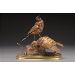 After Ferdinand Pautrot, YOUNG PHEASANTS, a bronze study of two birds standing on a moulded bas...