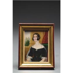 MINIATURE PORTRAIT OF A YOUNG LADY, painted in colours on ivory and contained in a walnut and par...