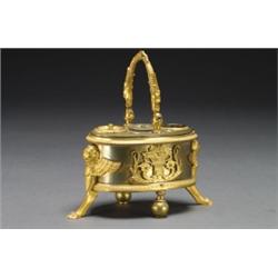 FRENCH ORMOLU, MOUNTED AND PATINATED BRONZE INKSTAND, with zoomorphic swing handle above, a f...