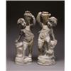 Image 1 : TWO ENGLISH LEAD, GARDEN STATUES OF PUTTO, each modelled leaning against a rocky outcrop or vas...