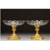 Image 1 : PAIR OF FRENCH GILT BRONZE AND CUT GLASS COMPORTS, of lobed circular shape, the pedestal bases...