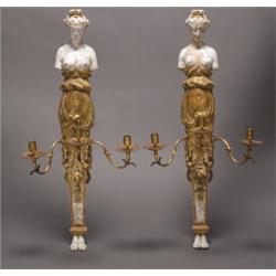 PAIR OF PARCEL-GILT AND PAINTED THREE-LIGHT SCONCES, each with crowned female bust painted in whi...