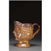 Image 1 : ENGLISH SALT-GLAZED STONEWARE JUG, modelled as the head of Bacchus wearing a crown of grapes, fol...
