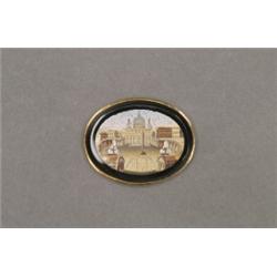 OVAL MICRO-MOSAIC PANEL, depicting the Vatican, in an onyx frame, bezel set in a gold-filled broo...