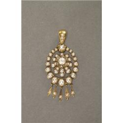 14K YELLOW GOLD, PENDANT, formed as a stylized flower suspended within a, scallop-edged frame...