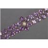 Image 1 : 14K YELLOW GOLD BRACELET, set with 30 oval cut amethysts, with a central, medallion set with a...
