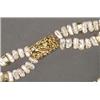Image 1 : DOUBLE STRAND PEARL NECKLACE, composed of 119 flattened freshwater pearls and completed with a 14...