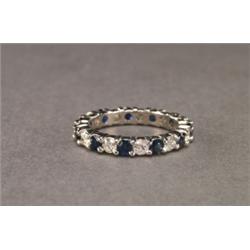 18K WHITE GOLD ETERNITY BAND, set with 11 brilliant cut diamonds (approx. 1.00ct. total weight) a...
