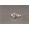 Image 1 : PLATINUM FILIGREE RING, set with a European cut diamond (approx. 0.50ct.) in a mount, decorated...