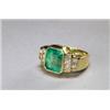 Image 1 : 18K YELLOW GOLD, COCKTAIL RING, bezel set with an emerald cut emerald (approx. 3.80ct.) in a st...