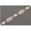 Image 1 : 18K WHITE GOLD FILIGREE BRACELET, formed of panels, of 3 rows of cultured pearls, separated b...