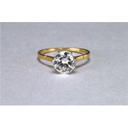 18K YELLOW GOLD AND PLATINUM SOLITAIRE RING, set with a brilliant cut diamond (approx. 1.65ct.),...