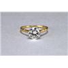 Image 1 : 18K YELLOW GOLD AND PLATINUM SOLITAIRE RING, set with a brilliant cut diamond (approx. 1.65ct.),...