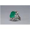 Image 1 : 14K WHITE GOLD COCKTAIL RING, set with a large emerald cut emerald (approx. 18.75ct.) encircled b...