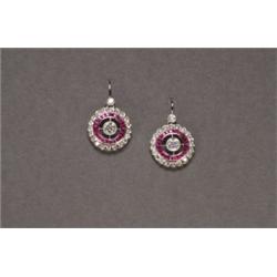 PAIR OF 18K WHITE GOLD HOOK BACK DROP, EARRINGS, each centering a brilliant cut diamond (approx...