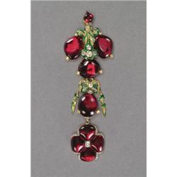 14K AND 18K YELLOW GOLD SECTIONAL PENDANT, set with 9 shaped garnet cabochons and 78 various old...