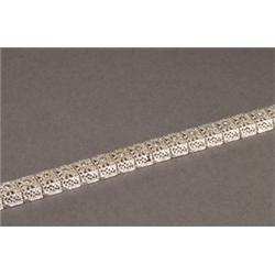14K WHITE GOLD FILIGREE STRAIGHTLINE BRACELET, set with 26 brilliant cut diamonds (approx. 2.14ct...