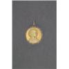 Image 1 : FRENCH 18K YELLOW GOLD AND PLATINUM CIRCULAR PENDANT, set with a carved ivory cameo of Mary withi...