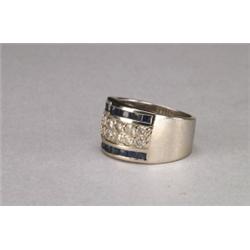 14K WHITE GOLD WIDE BAND, set with 12 brilliant cut diamonds (approx. 0.75ct. total weight) borde...