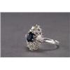 Image 1 : 18K WHITE GOLD COCKTAIL RING, set with an oval cut, sapphire (approx. 1.70ct.), encircled by...