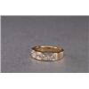 Image 1 : 14K YELLOW GOLD BAND, channel set with 6 princess cut diamonds (approx. 1.20ct. total weight), 3....