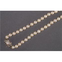 SINGLE STRAND MIKIMOTO PEARL NECKLACE, composed of 152 cultured pearls (5.5mm to 6.0mm) and compl...