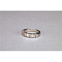 14K WHITE GOLD BAND, channel set with 8 princess cut and 6 baguette cut diamonds (approx. 0.50ct....