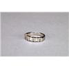 Image 1 : 14K WHITE GOLD BAND, channel set with 8 princess cut and 6 baguette cut diamonds (approx. 0.50ct....