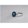 Image 1 : PLATINUM COCKTAIL RING, set with an oval cut sapphire (approx. 3.00ct.) flanked by 2 brilliant cu...