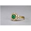 Image 1 : ISRAELI 18K YELLOW GOLD RING, set with a circular emerald cabochon encircled by 18 brilliant cut...