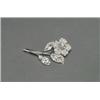 Image 1 : PLATINUM FILIGREE BROOCH, realistically formed as a flower and set with 2 large European cut diam...