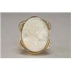 Image 1 : 14K YELLOW GOLD RING, bezel set with an oval carved opal cameo depicting a classical, maiden in...