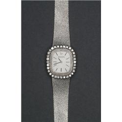 LADY'S ROLEX, WRISTWATCH, circa 1965; case #60302; 17 jewel movement; black hands and applied b...