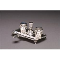 GEORGE II SILVER, INKSTAND, of oblong shape with gadroon rim and scroll and shell handle on fou...