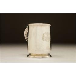 GEORGE II SILVER MUG, of near-cylinder form with scroll handle and plain moulded rim and foot, in...