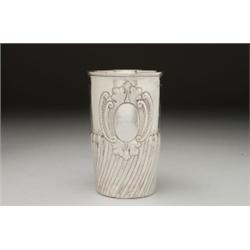 GEORGE II SILVER LARGE BEAKER, of near-cylinder form, repoussT with curved flutes below a scroll...