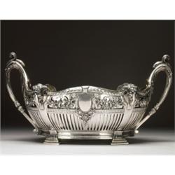 GERMAN SILVER, CENTREPIECE, the oval bowl with scroll handles at the ends pierced and repoussT...