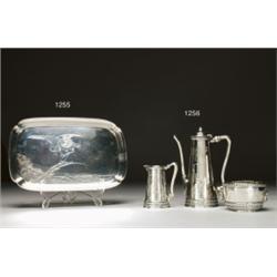 AMERICAN SILVER TRAY,, of oblong shape with indented corners on four bracket feet, engraved wit...