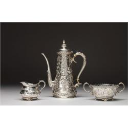 AMERICAN SILVER COFFEE SERVICE, repoussT with putti and cherubs and nude female attendants suppor...