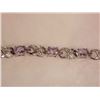 Image 1 : BRACELET - 12 OVAL FACETED PURPLE AMETHYST GEMSTONES & DIAMOND IN STERLING SILVER CROSSOVER LINK DES