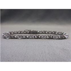 BRACELET - 6TCW WHITE TOPAZ & DIAMOND IN STERLING SILVER CROSS OVER LINK DESIGNED SETTING - RETAIL E