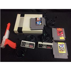 NINTENDO VIDEO GAME SYSTEM W/ CONTROLLERS, ZAPPER GUN & GAMES