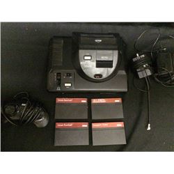 SEGA GENESIS POWER BASE CONVERTER WITH 4 GAME CARTRIDGES