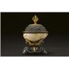 Image 1 : A FINE AND RARE SILVER AND BRONZE KAPALA,, fashioned from a monkey skull, the diminuitive bowl...