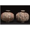 Image 1 : A PAIR OF GREY PAINTED POTTERY COCOON VESSELS, painted in red and white with bold arabesques on a...
