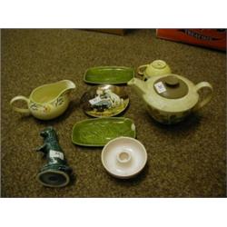 A Group of Poole Pottery Items, including a teapot, a standing stoat, a milk jug and other items (qt