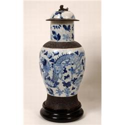 A Chinese Crackleware Vase and Cover, decorated dragons and flowers in underglaze blue, 54 cm See i