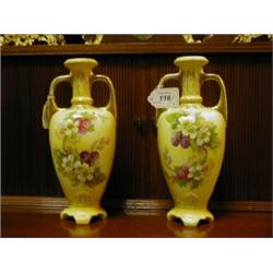 A Pair of Royal Bonn Vases, decorated fruits and flowers on a pale yellow ground, 24 cm